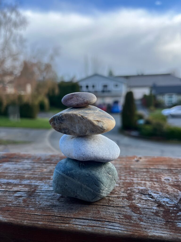 4 rocks balancing on each other